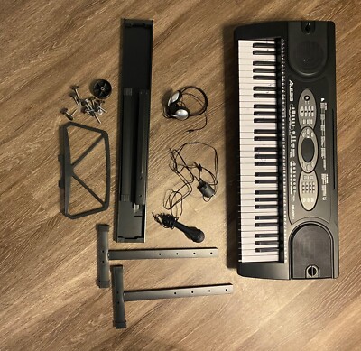Alesis melody 61 key keyboard piano with stand, microphone, and