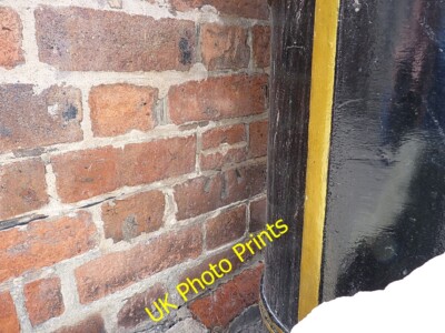 Photo 6x4 OS benchmark - Montgomery, Town Hall The mortared-up remnants o c2015