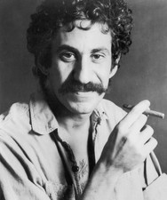 American singer songwriter Jim Croce holding a cigar His denim shir- Old Photo