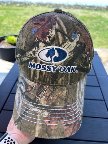 Mütze Kappe Marke Mossy Oak Camouflage mit blau/weißen Logo-Akzenten Hakenschlaufe gebraucht, in einwandfreiem Zustand