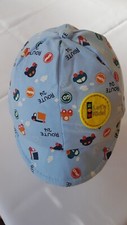 baby boy cap in blue. 45cm, car themed pics, little embroidered badge, lined