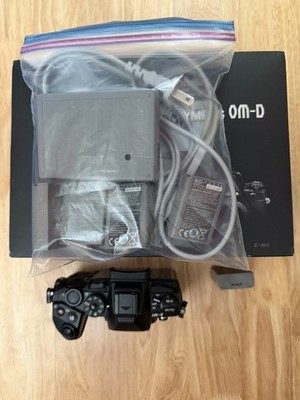 Olympus OM-D E-M1 Mirrorless Camera Body Black US with 3 extra Olympus Batteries