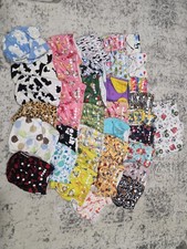 Mixed lot of 36 cloth diapers, all in ones, liners and Wet Bag