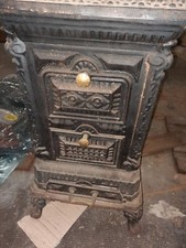 STUFA IN GHISA ANTICA STUFA IN GHISA