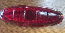 One 1949-50 Ford Stimsonite Glass Tail Light  FRST-48, Chip in Glass See Descrip
