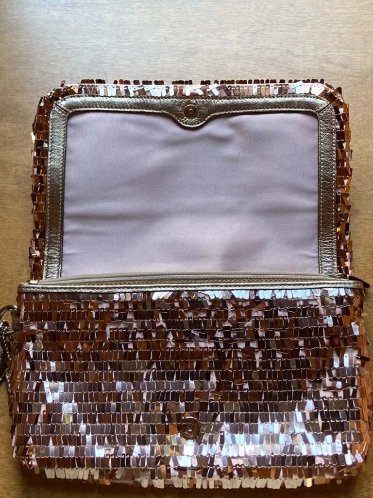 Borsa da polso Coach in pelletteria artigianale paillettes oro rosa nuova con etichette