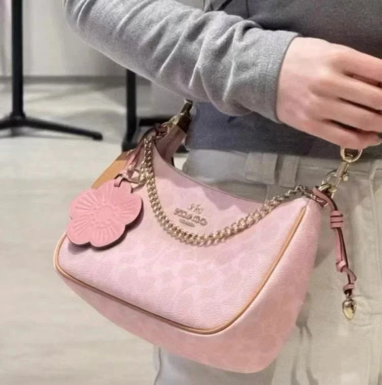 Coach Faux Leather Exterior Pink Bags & Handbags for Women for
