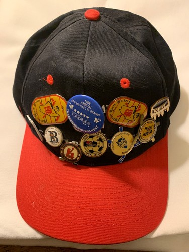 Hockey, Maine youth KC brand snap back cap with 10 collector pins attached.