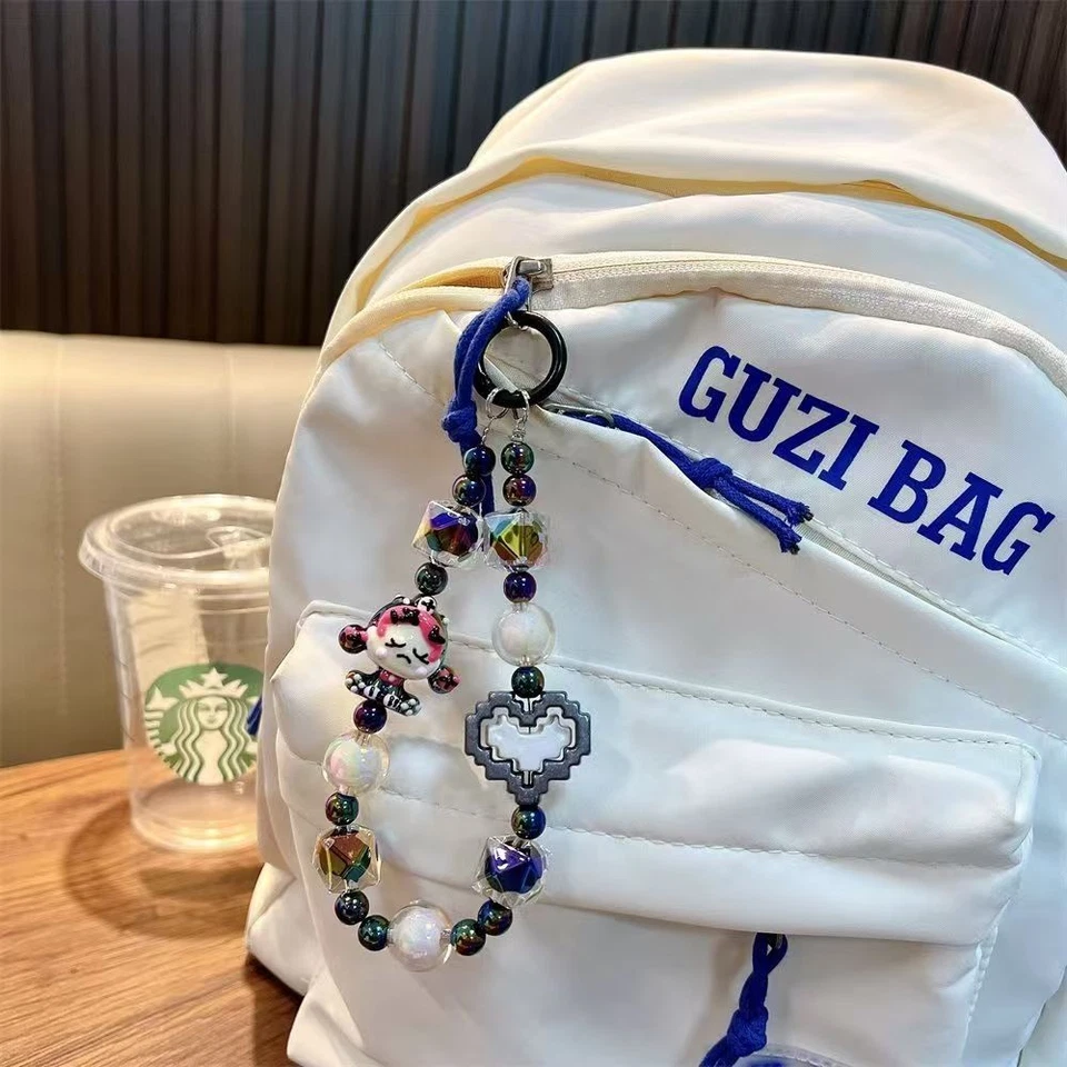 Muñeca de dibujos animados figura bloque cuentas teléfono cordón muñeca correa bolso llavero encanto Foto 3 de 4