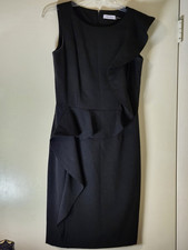 Calvin Klein Black Solid Sheath Dress 4 Sleeveless Round Neck Knee Lined Stretch