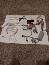 Wii AC Adapter Audio Video Cables and 3 Nunchuck Also Ten nis Golf Gun And Bat