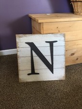 large wooden wall letter. Color brown. Condition New.