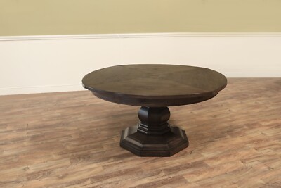 Expanding Round Jupe Dining Table with Self-Storing Leaves by