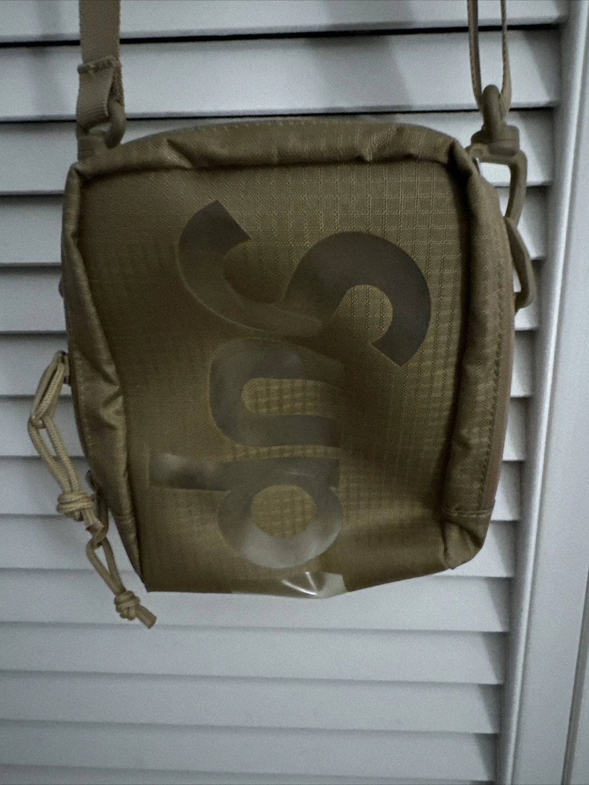 Pochette cou suprême (SS21) bronzage 
