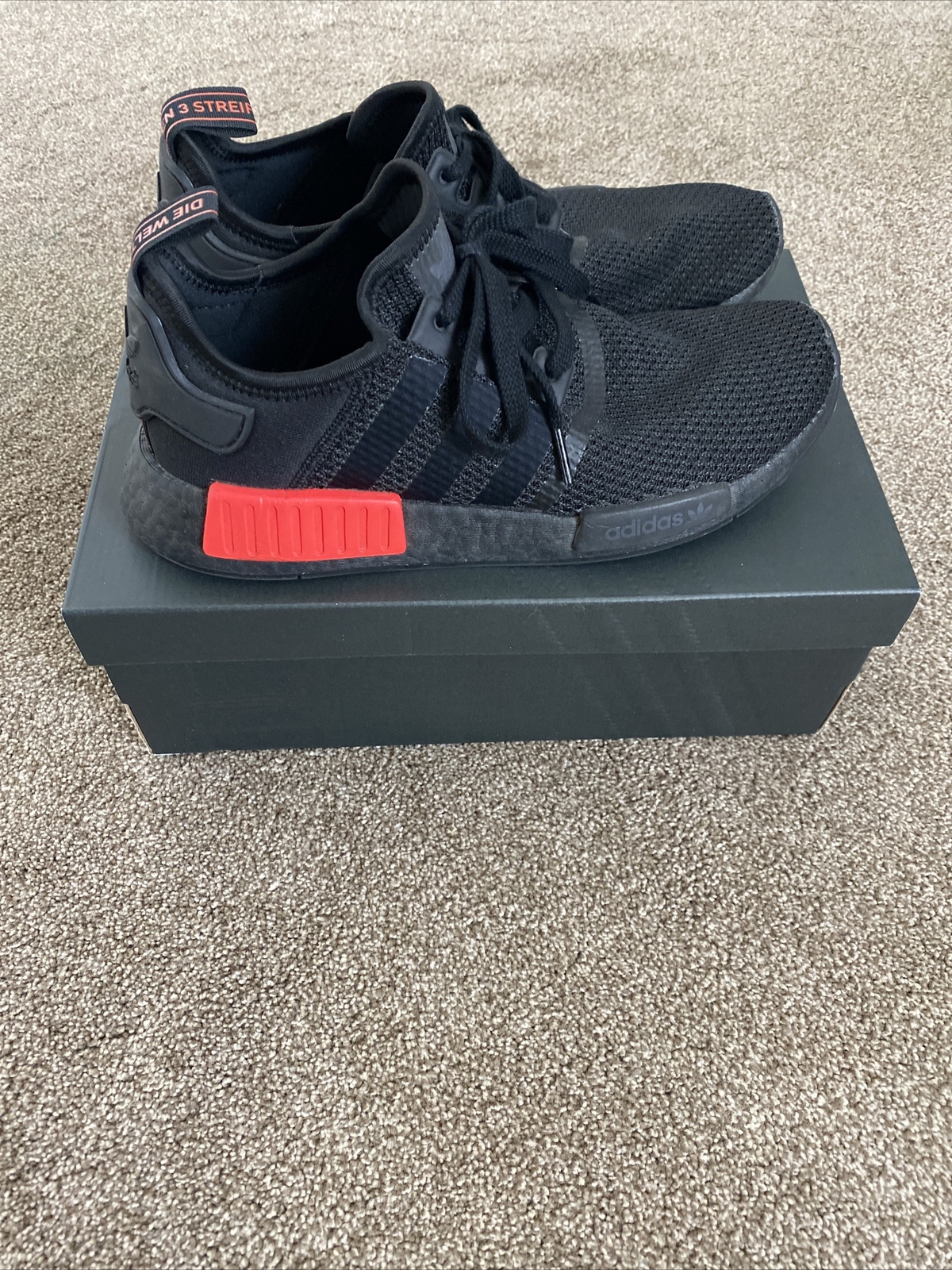 adidas nmd r1 primeknit japan triple black