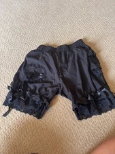 Black dance shorts with ruffles, ribbons and heart, elastic waist size Child M