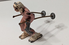 VINTAGE LEAD PINK WHITE SKI FIGURE WITH POLES