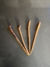 a set of four wood handmade hairsticks