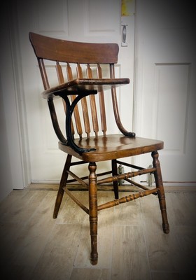 students chairs with table arms