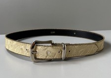 Gold And Black Belt With Silver Buckle