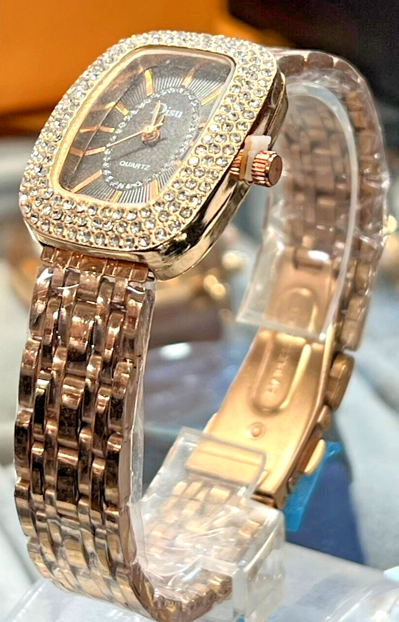 Elegant gold gold women's watch with crystal bezel