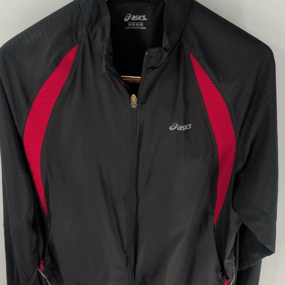 Chaqueta cortavientos Asics ligera con cremallera completa bolsillos con cremallera negra roja talla M Foto 3 de 4