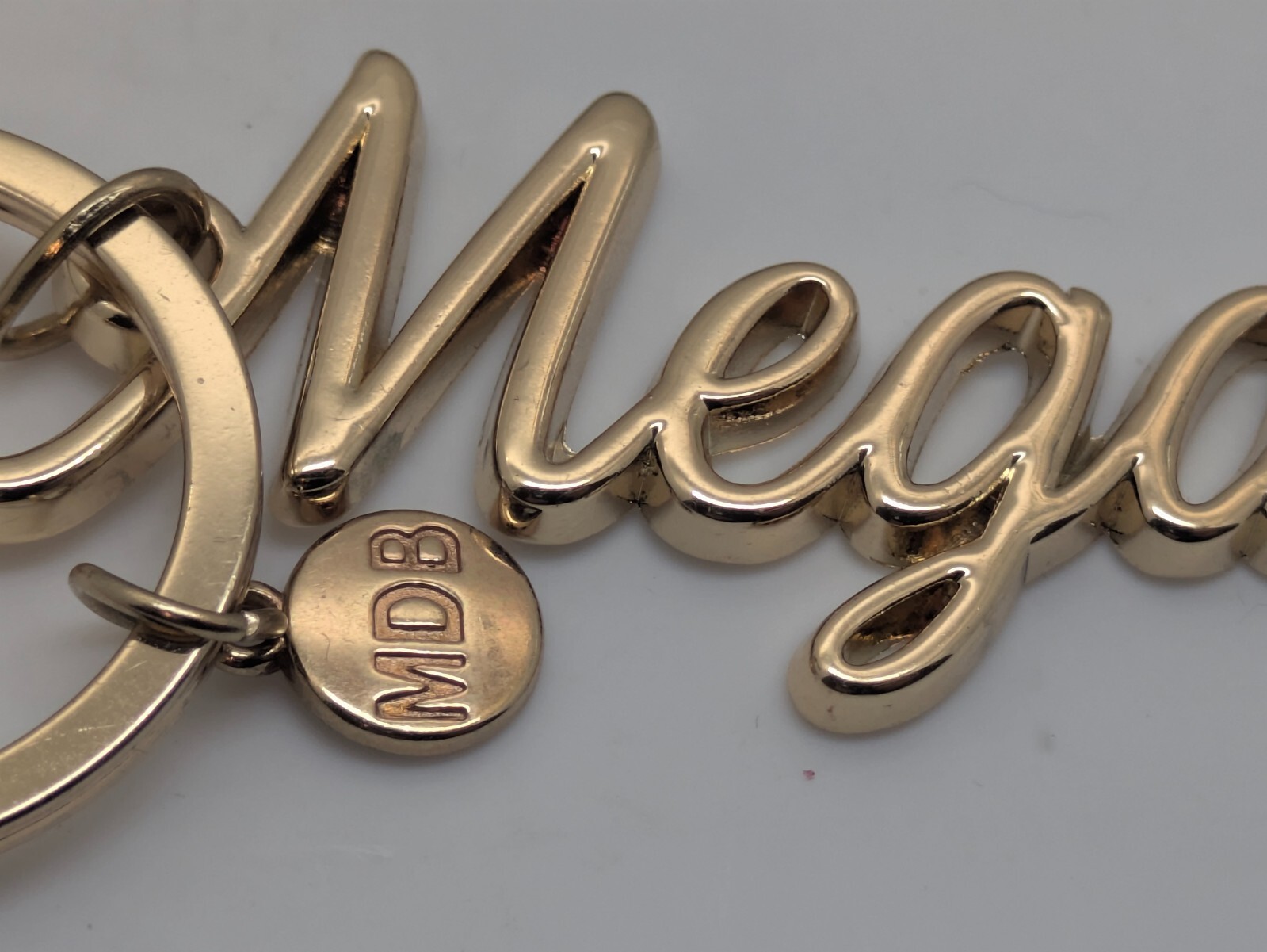 Namesake "Megan" Keychain Gold Toned Metallic