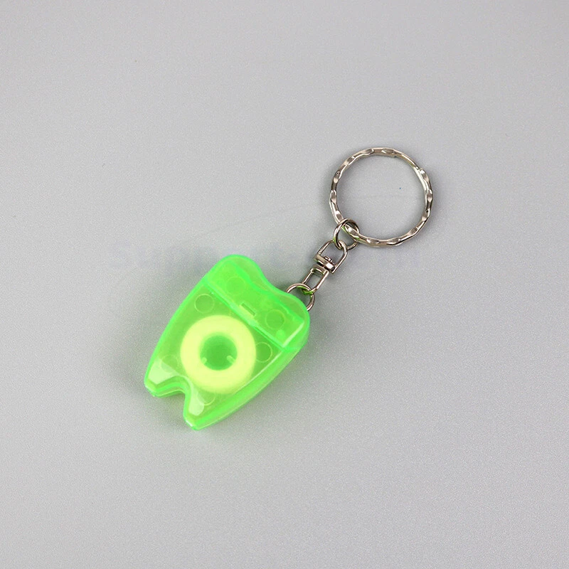 5x Mini llavero dental tipo hilo dental limpieza de dientes selección 15 m colores aleatorios Foto 4 de 4