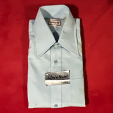 1970s blue button down the front with a few stains, but never worn with tags  
