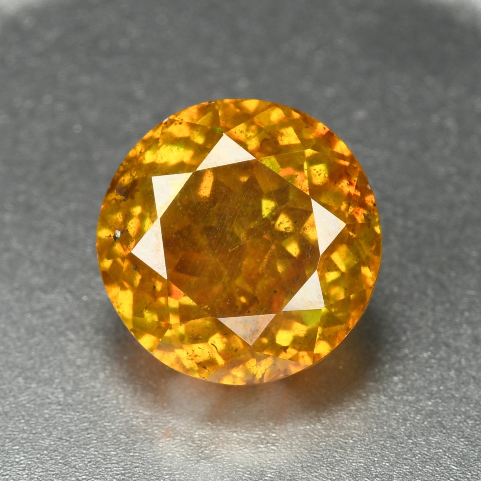 7.23 Ct Fair Round Cut 10.4 MM 100 Natural Yellowish Orange Spain