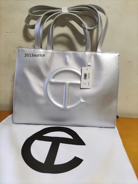 NWT Telfar Shopping Bag Brand New with Tags Medium silver best deal NWT Telfar Shopping Bag Brand New with Tags Medium silver best deal
