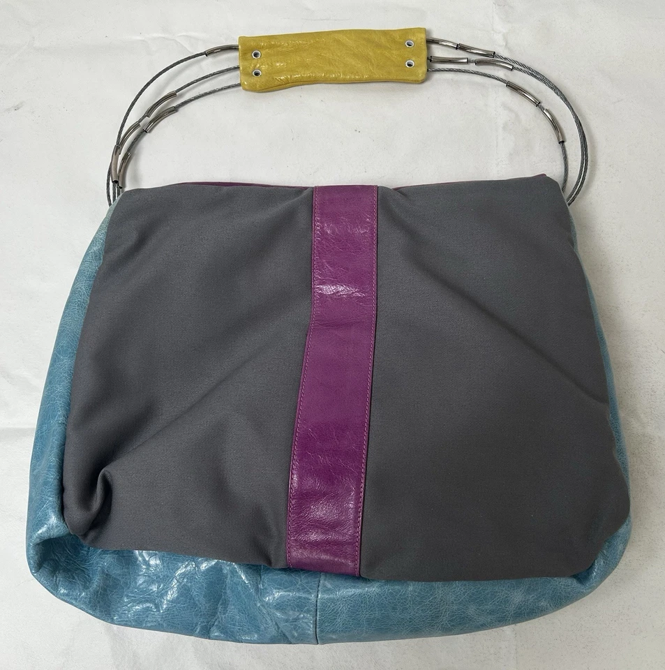 Bolso/cartera de cuero colorido Cirque Du Soleil con mango de correa de alambre guía juguetón Foto 4 de 4