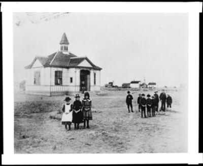 Students in front of the school building on Main Street in old Pal - Old Photo