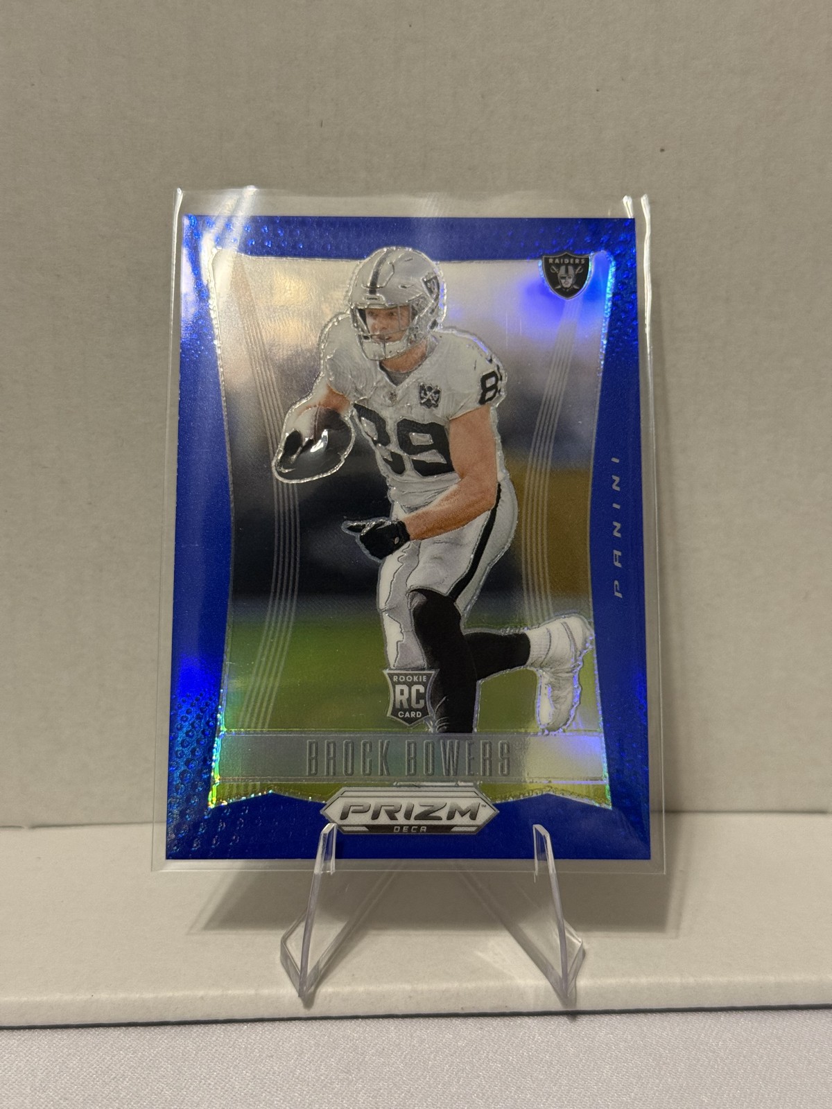 2024 Panini Prizm Deca - Brock Bowers #170 Blue Prizm /149 (RC)