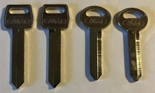 4 VINTAGE UNCUT KEY BLANKS FORD Motor Company.