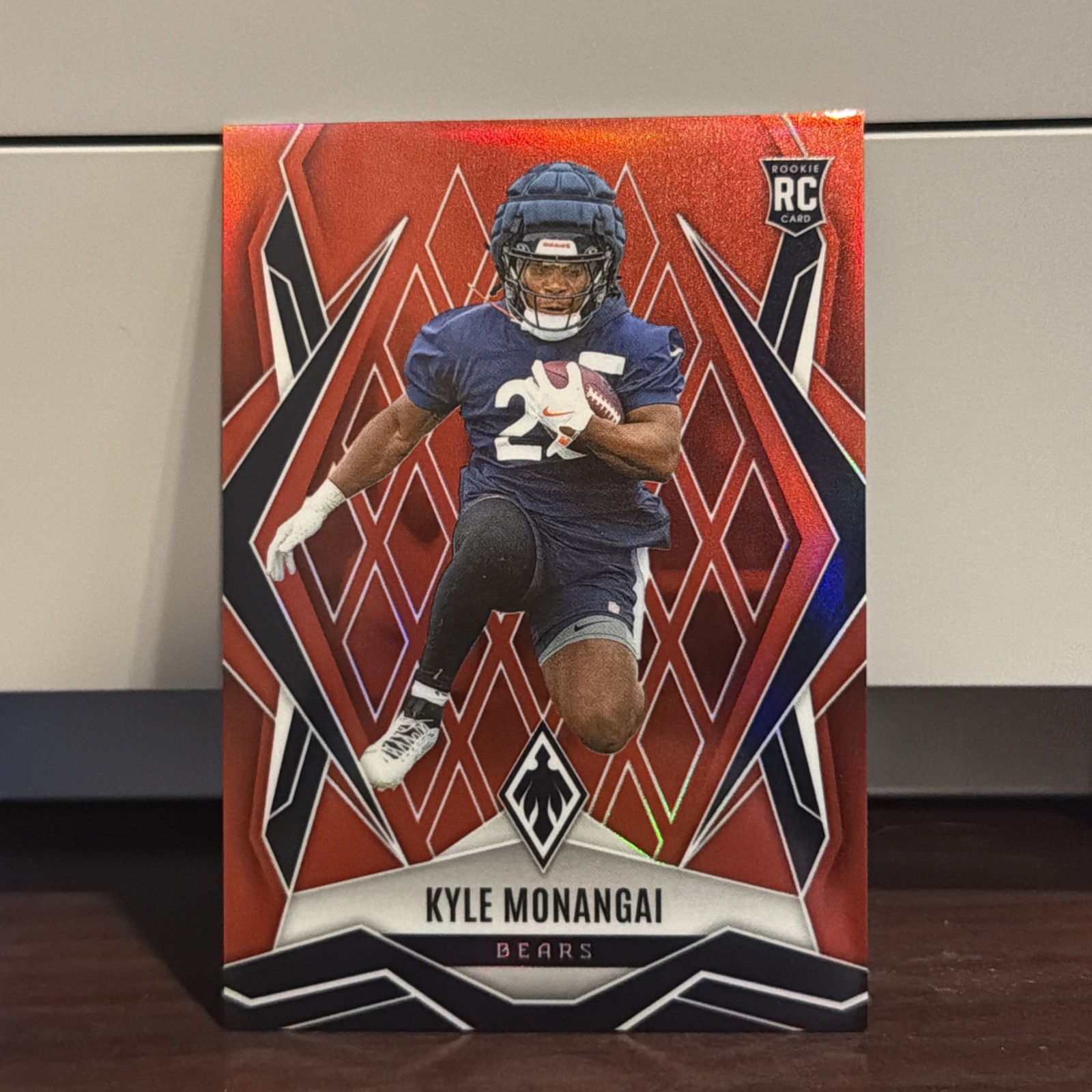 2025 Panini Phoenix Rookies Red Seismic 40/99 Kyle Monangai #249