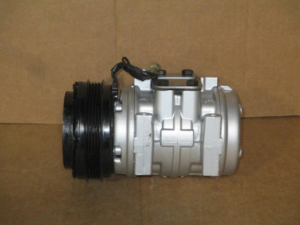 COMPRESOR DE AIRE ACONDICIONADO COMPATIBLE CON MAZDA 323 1986-1989, FORD ESCORT - OEM # FOCZ19972A Foto 3 de 4