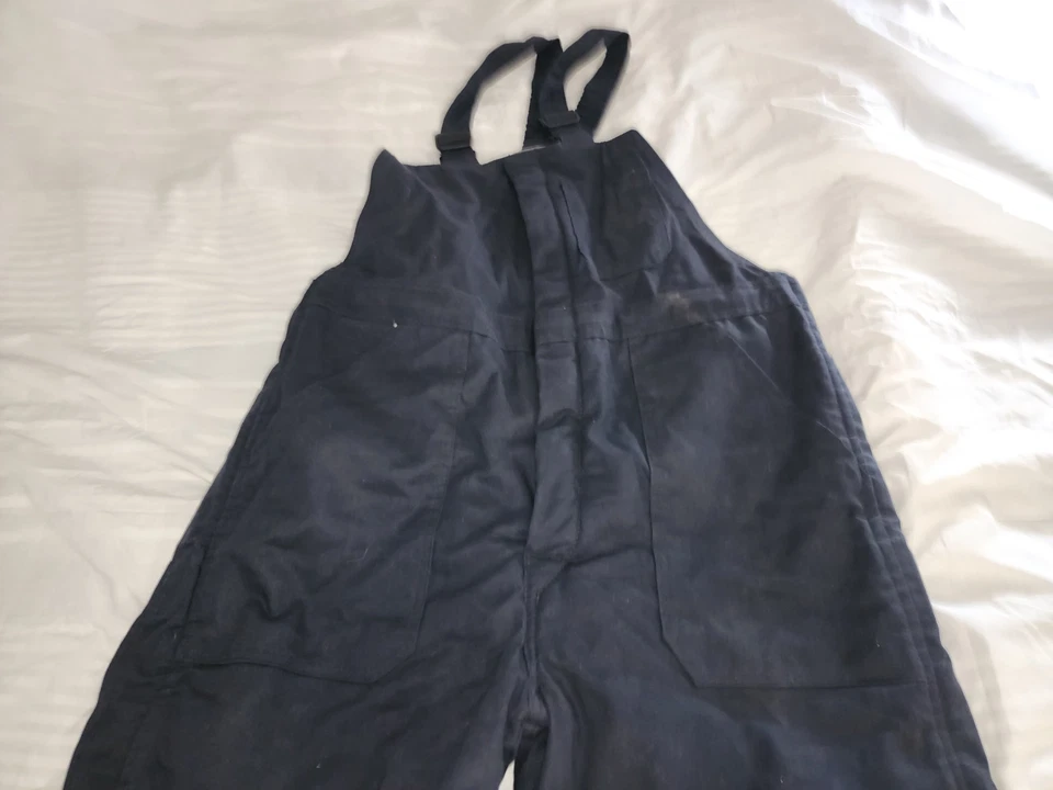 Ropa protectora de baluarte Fr ropa de trabajo resistente al fuego para hombre aislada... Foto 4 de 4