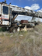 Cat 340 Track Hoe.   Final drives with chain and track