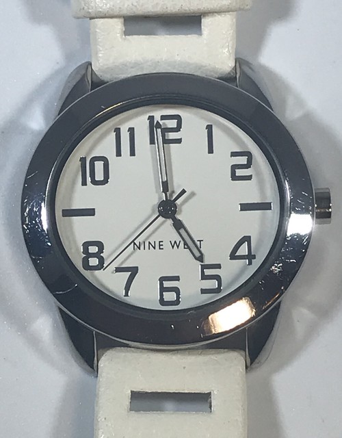 Nine West Women’s Watch NW/1279 Y121E Silver Tone White Leather Band