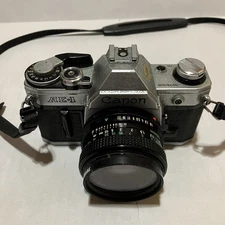 Vintage Canon AE-1 SLR Camera w/ FD 50mm 1:1.8 Lens UNTESTED
