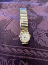 Timex Quartz Ladies Watch Gold/Silver Tone Stretch Band Water Resistant (CA)