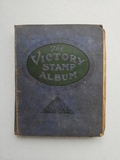 Victory Stamp Album In Poor Condition Containing Worldwide Stamps