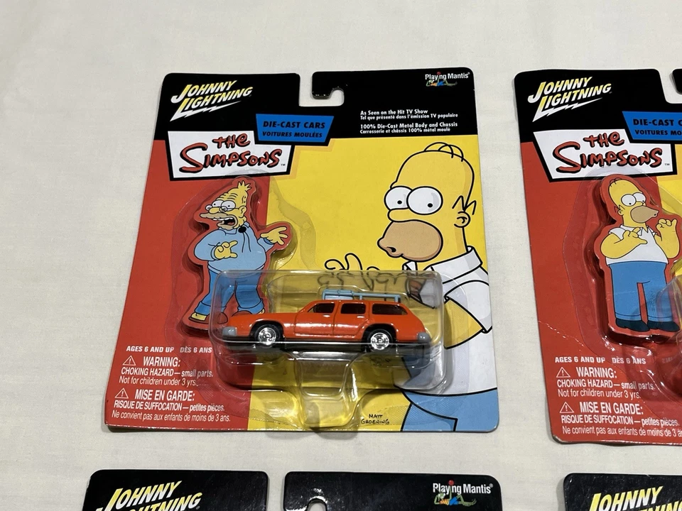 Johnny Lightning Los Simpson Juego de 4 Coches Fundidos a Diecast - Todo Nuevo Sellado OBO NUEVO Foto 2 de 4