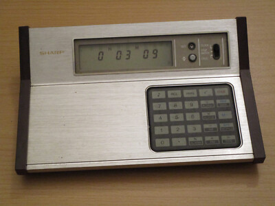 Sharp Electronic Calculator CT-650 eleganter vintage Taschenrechner +Wecker 70er