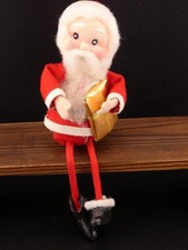 Vintage Christmas Santa Claus Shelf Sitter with Foil Wrapped Present Decoration