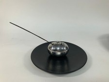 Bruciatore di incenso ALESSI "Uma" in acciaio inox con piastra in ceramica di Kristiina Lass