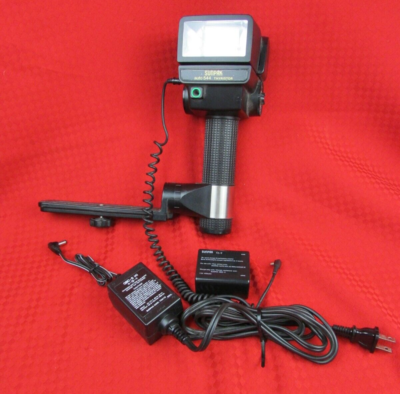 SUNPAK Auto 544 Thyristor Handle Flash w/battery, charger, camera 