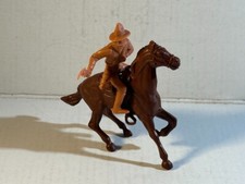 Marx 1950's 54mm Cowboy masked bandit on brown stopping horse.