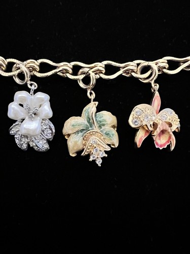 Nolan Miller Signed Gold Tone Charm Bracelet Rhinestone Floral 10 Charms - Picture 5 of 10